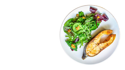 pink salmon steak fried and salad,grilled seafood, pescatarian Menu concept food background keto or paleo diet. top view. copy space for text