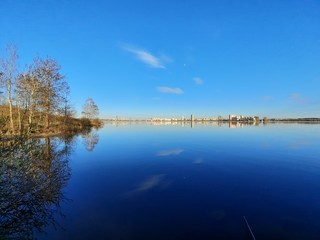 reflection of trees in the water