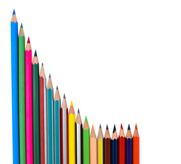 A row of different color wood pencil crayon placed in front of a white background