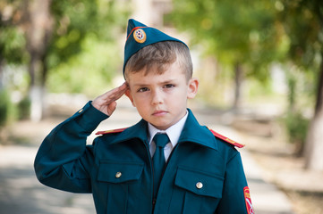 cadet boy in uniform on the street. Study at school