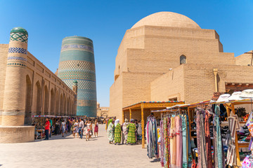 Khiva/Uzbekistan:08.20.2019-The view o famous bazaar street in Khiva - obrazy, fototapety, plakaty