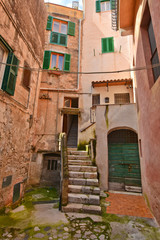 Fototapeta na wymiar Old houses in the medieval small town of Terracina, Italy