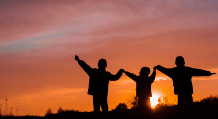 Fototapeta na wymiar children at sunset