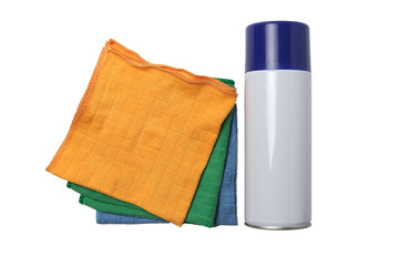 three cleaning multi-colored cloths  and a can of cleaning agent with a blue lid, isolate on white background