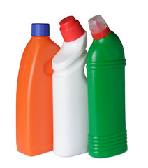 three plastic blank multi-colored bottles with cleaning agent in a row, white, orange, green, isolate on white background