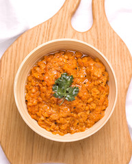 Dhal traditional indian bean dish with cilantro close up