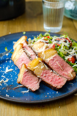 Grilled steak with salad on the side:
