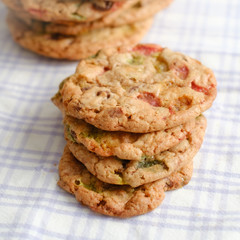 Stack of new baked cookies on tablecloth