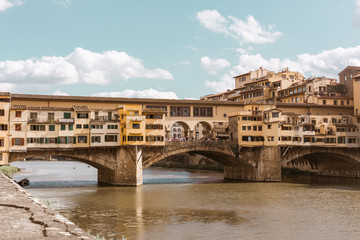 Naklejka premium Ponte Vecchio from the nearby bridge