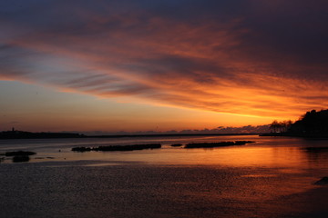 Sunset at the ocean, silhouettes, natural colors
