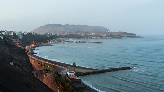 Timlapse of the night, passing through the sunrise and day of Morro Solar in Chorrillos, Lima - Peru.