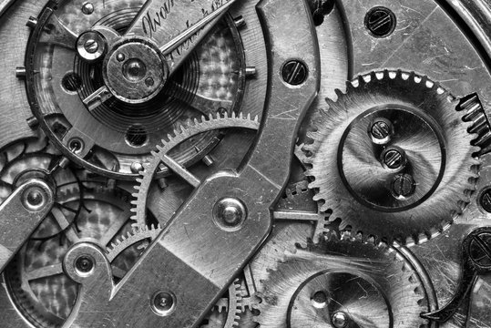 Old Clock Watch Mechanism with gears - close-up, black and white