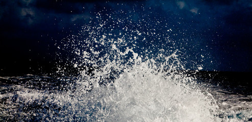 Splash of the sea on a speeding boat