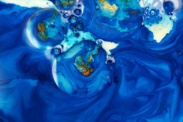 Abstract blue bubble and wave horisontal background. Marble texture. Acrylic color in water and oil.