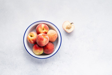 Healthy breakfast fruits and berry set on grey background. The concept of delicious and healthy food. Top view, copy space.