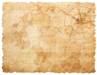 Old compass on paper background