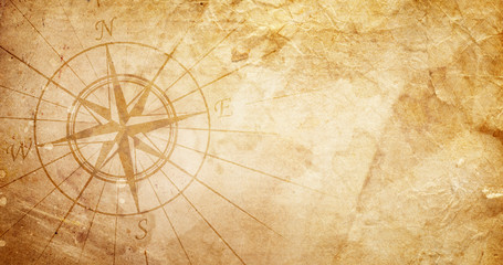 Old compass on paper background - 345723136