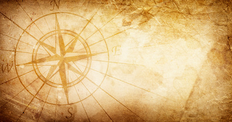 Old compass on paper background - 345723147