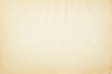 Old brown crumpled sheet of paper texture background. Beige vintage paper with copy space for text.