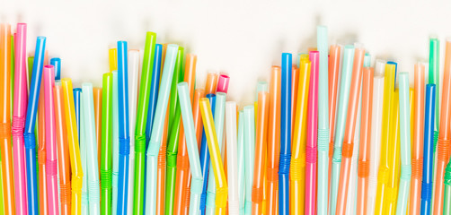 background of multi-colored plastic tubes, long banner