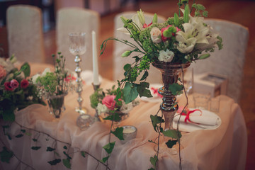 The beautifully arranged wedding decor renders the atmosphere of the holiday