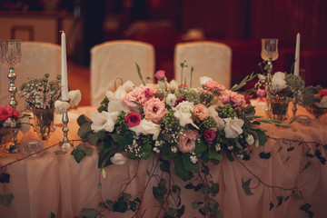 The beautifully arranged wedding decor renders the atmosphere of the holiday