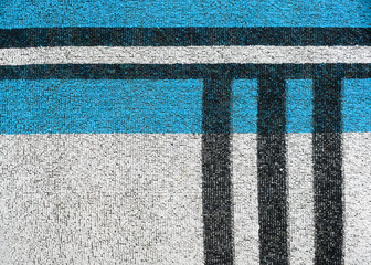 Fototapeta na wymiar Striped terry towel in black, white and blue. Terry cloth texture closeup.