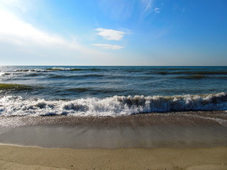 Sea surf on a sunny morning.