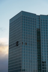 multi-storey buildings of glass and concrete in good weather and morning light