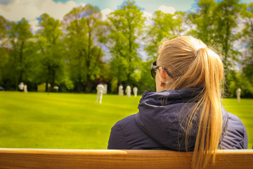 Young wife at the cricket