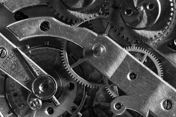 Obraz na płótnie Canvas Old Clock Watch Mechanism with gears - close-up, black and white