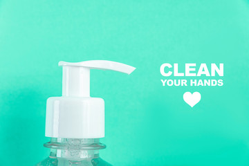 Container with alcohol gel on the light blue background