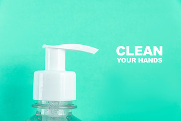 Container with alcohol gel on the light blue background