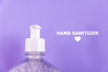 Container with alcohol gel on the light blue background