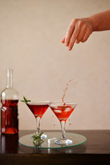 Red wine coctails with ice and rosemarine