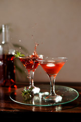 Red wine coctails with ice and rosemarine