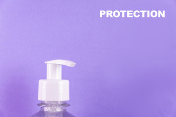 Container with alcohol gel on the light blue background