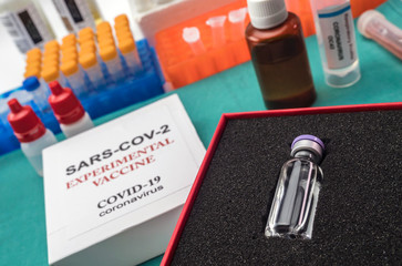 Coronacirus covid-19 experimental vaccine in a laboratory, conceptual image