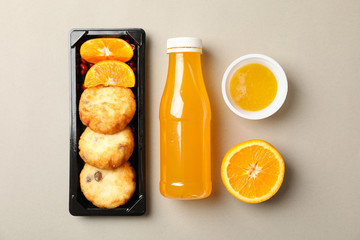 Food delivery. Food in takeaway box on gray background