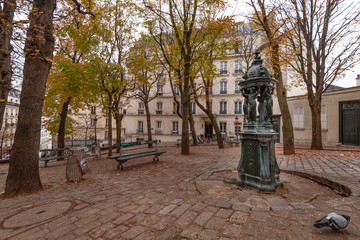 the quiet Place Émile-Goudeau in Montmartre, with the fountain