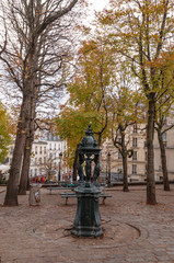 the quiet Place Émile-Goudeau in Montmartre, with the fountain