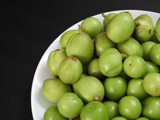 raw nectarine and sour plum,first sour fruits in spring,