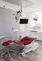 Dentistry office and stomatological equipments for treat tooth. Dentist tool kit and instruments. Treatment concept.