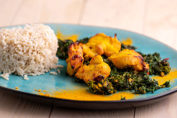 indian murgh palak dish with rice