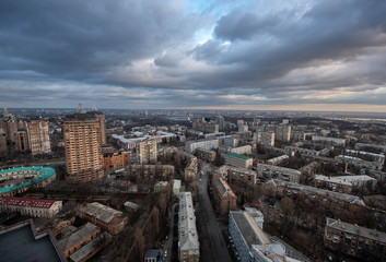 Fototapeta premium Dramatic red sunset city view of Kyiv (Kiev) Ukraine