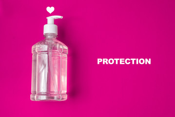 Container with alcohol gel on the red background