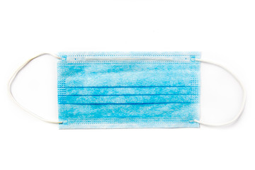 blue medical mask on a white highlighted background
