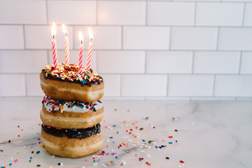 donut birthday cake with candles