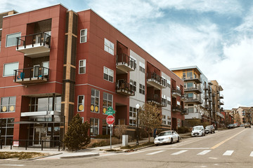 Commercial businesses and modern condominium developments in the Lower Highlands neighborhood of Downtown Denver (LoHi).  Denver, Colorado