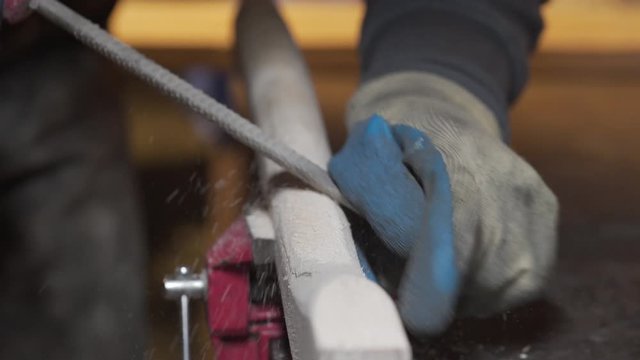 shaping the handle of an axe